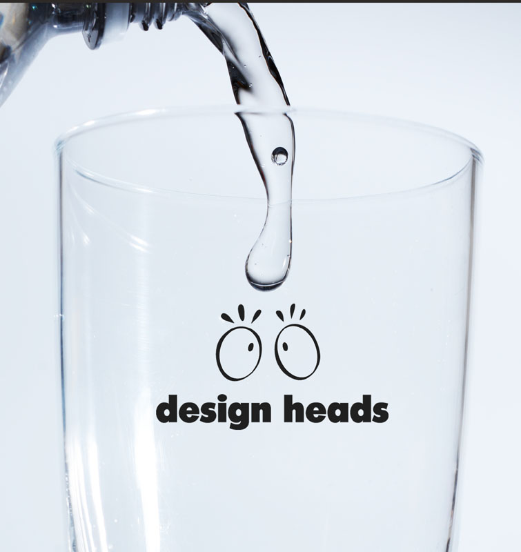 Pour Design Heads Logo